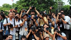 Điều kiện nào để được xét thăng hạng lên chức danh nghề nghiệp phóng viên hạng I, II?