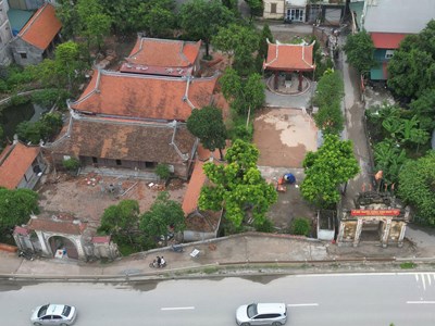 Giữ hồn cốt trăm năm cho cổng làng 