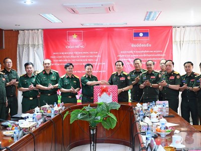 Binh đoàn 15: Thăm, chúc Tết Bunpimay và kiểm tra tiến độ dự án cụm bản Mường Chăm tại Lào