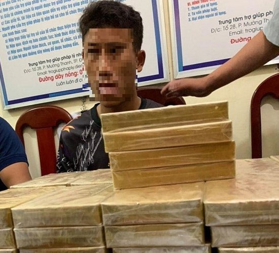 Bắt quả tang 3 đối tượng mua bán 54 bánh heroin - Anh 1