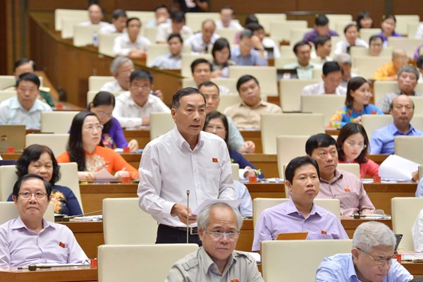 Quốc hội chất vấn Bộ trưởng Bộ Công an Tô Lâm: Lo lắng về tội phạm ma túy, xâm hại tình dục - Anh 1