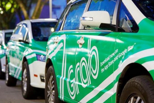 Taxi công nghệ không buộc phải đeo “mào” - Anh 1