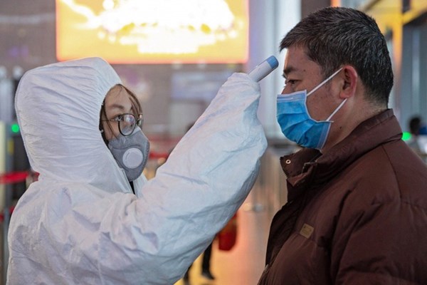 WHO sửa lỗi, thừa nhận mức độ nguy hiểm toàn cầu của virus Vũ Hán - Anh 1