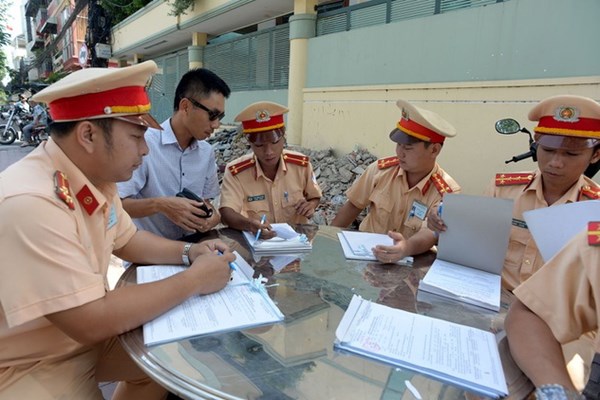 Thí điểm nộp phạt vi phạm giao thông qua mạng từ 12.3 - Anh 1