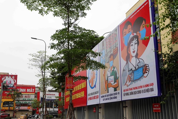 Tranh cổ động tiếp lửa chống dịch Covid-19 giữa phố phường Hà Nội - Anh 5