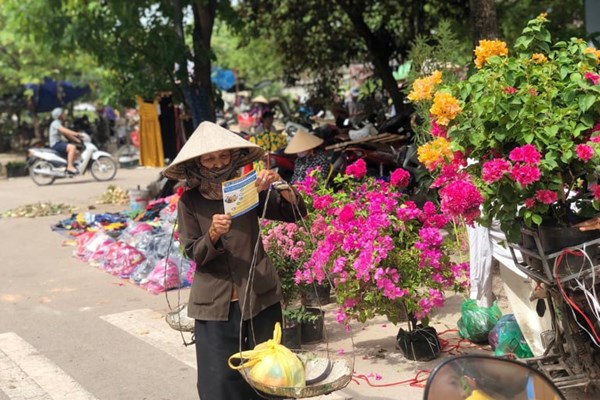 BHXH Việt Nam “rà từng ngõ, gõ từng nhà” - Anh 7