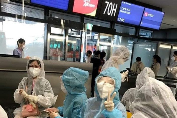 Hơn 220 công dân Việt Nam từ Nhật Bản về nước an toàn - Anh 1