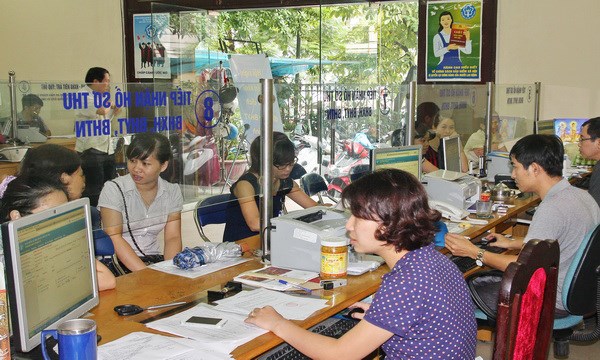Thanh toán không dùng tiền mặt trong chi trả, thu nộp BHXH - Anh 1