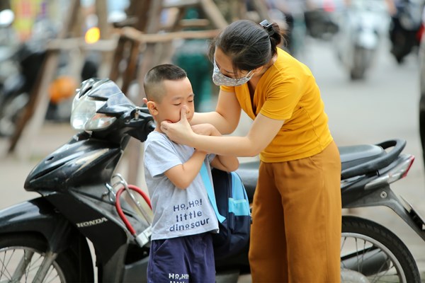 Người Hà Nội chủ động trước gió lạnh đầu mùa - Anh 10