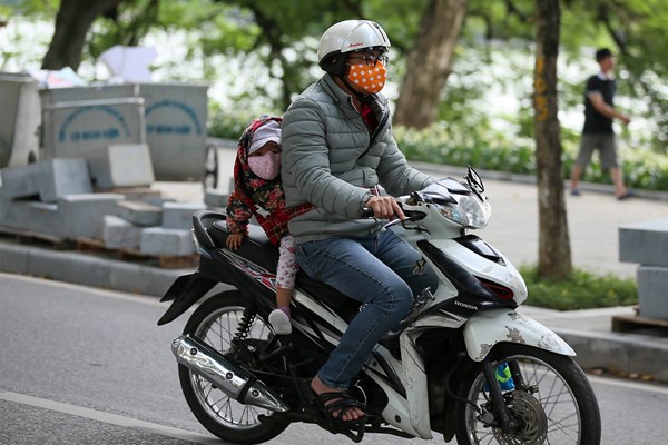 Người Hà Nội chủ động trước gió lạnh đầu mùa - Anh 4