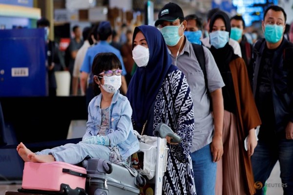 Nhiều nước cấm nhập cảnh vì biến chủng mới của Covid-19 - Anh 1