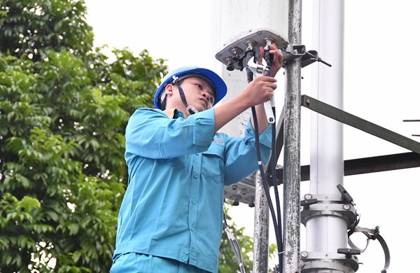 Hà Nội: Đảm bảo chất lượng mạng và dịch vụ bưu chính, viễn thông phục vụ công tác phòng chống dịch Covid-19 - Anh 1