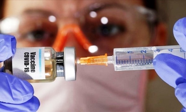 Cuộc chiến vắcxin ngừa Covid-19: Phép thử về đạo đức - Anh 1