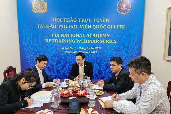 Cục Đối ngoại của Bộ Công an hội thảo trực tuyến với Cơ quan điều tra Liên bang Hoa Kỳ - Anh 1