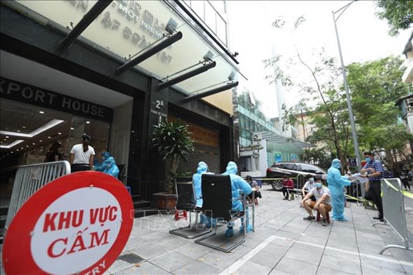 Đã có 26 nhân viên T&T dương tính với SARS-CoV-2 - Anh 1