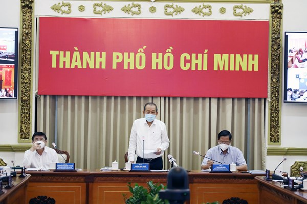 TP.HCM: Quyết tâm đến tháng 8 khống chế dịch Covid-19 - Anh 1