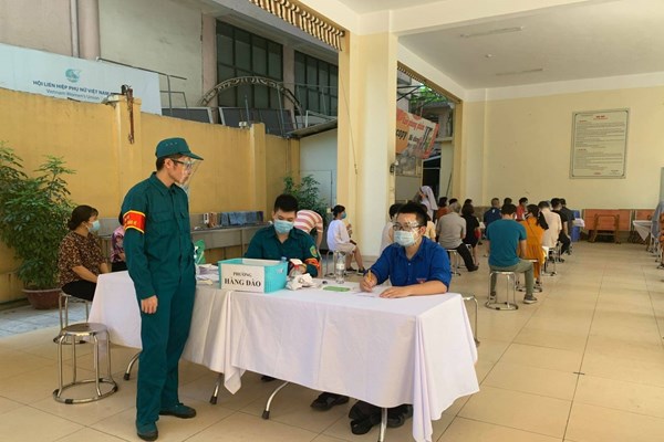 Hà Nội tìm người đến điểm tiêm chủng tại Trường THCS Trưng Vương (Hoàn Kiếm) - Anh 1