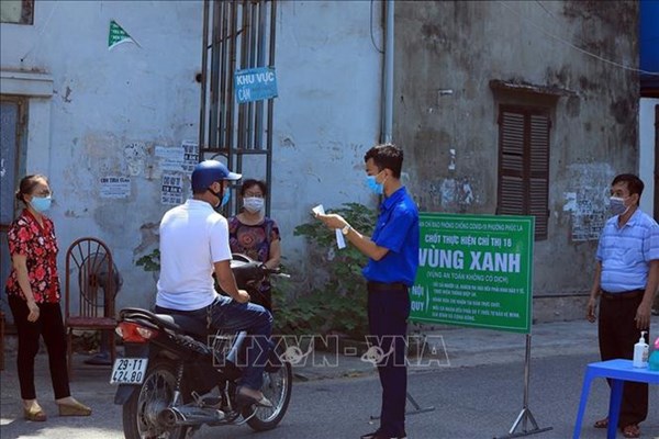 Hà Nội có thể cân nhắc điều chỉnh mẫu giấy đi đường - Anh 2