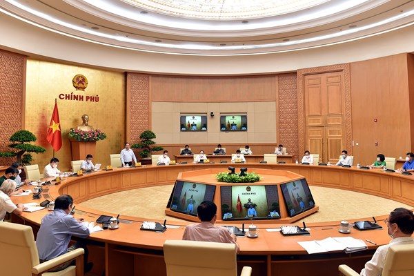 Thủ tướng: Việt Nam phải có vắc xin sản xuất trong nước sớm nhất có thể để bảo vệ tính mạng, sức khỏe nhân dân - Anh 1