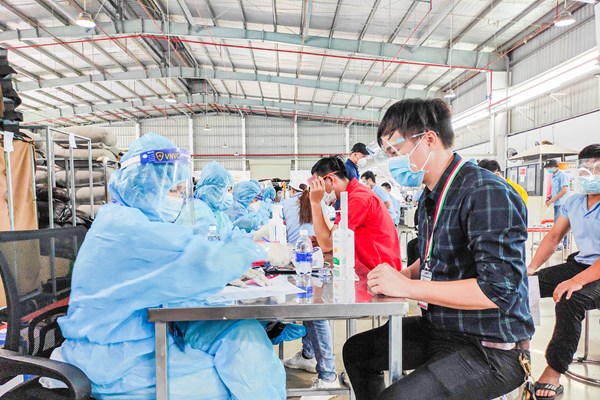 Viện Pasteur TP.HCM tiếp nhận hơn 1,1 triệu liều vắc xin phòng Covid-19 - Anh 1