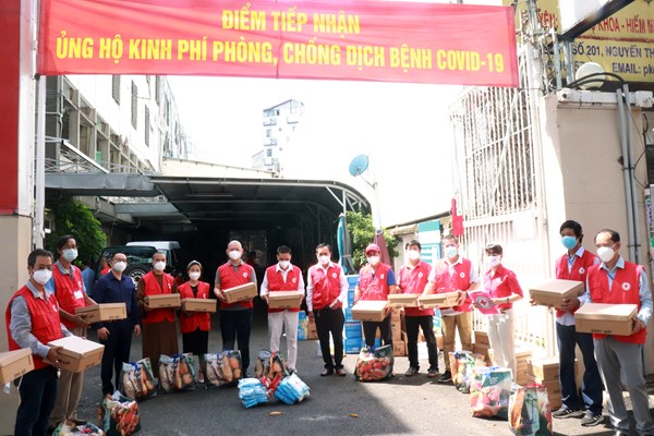 Nhiều hoạt động trợ giúp người dân bị ảnh hưởng Covid-19 trị giá gần 5,2 tỉ đồng - Anh 1