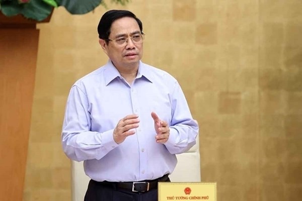 Kết luận của Thủ tướng Phạm Minh Chính tại cuộc họp trực tuyến với cấp xã, phường tại Thành phố Hà Nội về phòng, chống dịch Covid-19 - Anh 1