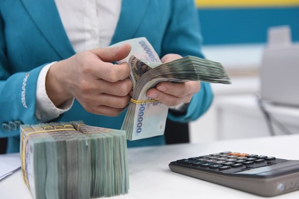 Nâng hạn mức trả tiền bảo hiểm tiền gửi lên 125 triệu đồng - Anh 1