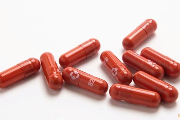 Quốc gia đầu tiên phê duyệt thuốc điều trị Covid-19 đường uống - Anh 1