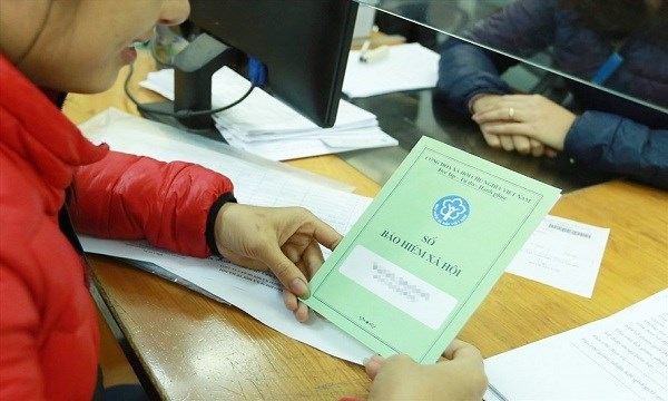 Đẩy mạnh phát triển người tham gia và thu BHXH, BHYT - Anh 1