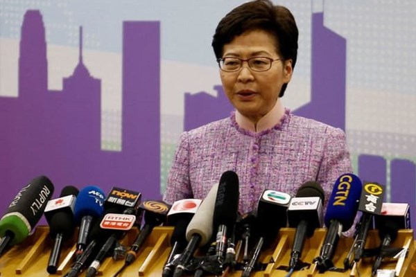 Lãnh đạo Hồng Kông ra lệnh điều tra 13 quan chức tham gia buổi tiệc có người nhiễm Covid-19 - Anh 2