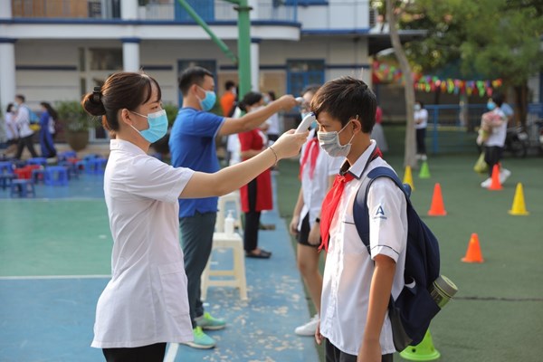 Thủ tướng yêu cầu xem xét mở cửa trường học trở lại sau Tết Nguyên đán - Anh 1