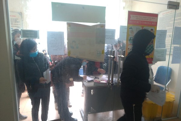 Người lao động mắc, chăm sóc người mắc Covid-19  được hưởng chế độ BHXH như thế nào? - Anh 1