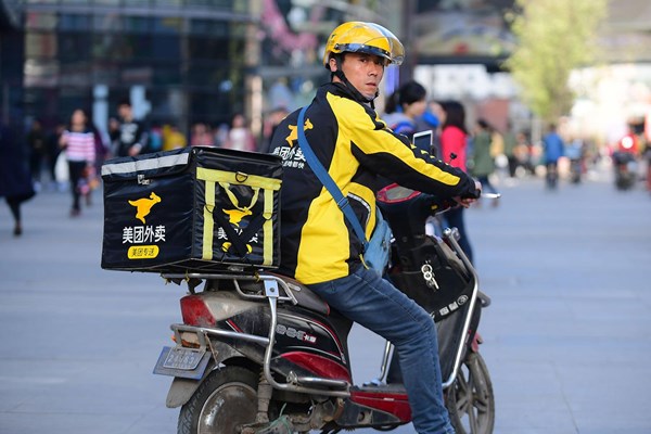 Trung Quốc: Vì sao cử nhân ùn ùn làm shipper? - Anh 1
