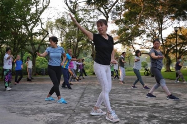 Singapore “chạm” mục tiêu trở lại cuộc sống bình thường - Anh 1