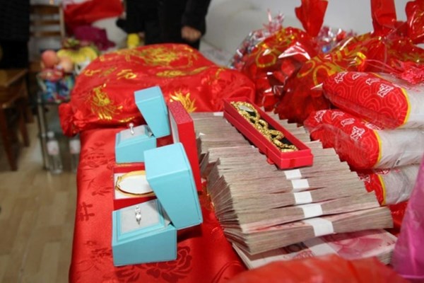 Trung Quốc​​​​​​​: Nói không với thách cưới cao - Anh 1