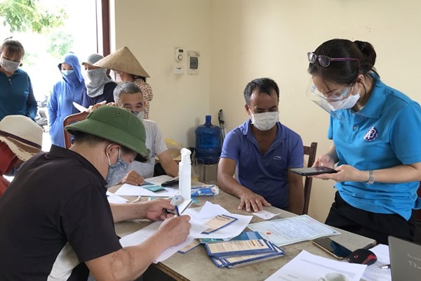 Các chỉ tiêu về người tham gia BHXH, BHYT tăng cao hơn năm 2021 - Anh 1