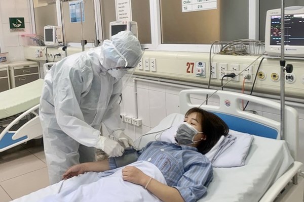 Nhiều thuận lợi cho người lao động hưởng BHXH khi bị ốm đau, mắc Covid-19, mắc bệnh nghề nghiệp - Anh 1