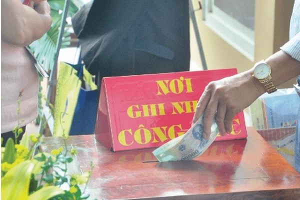 Thủ tướng yêu cầu kiểm tra tổng thể quản lý tiền công đức tại các di tích lịch sử - văn hóa, đình chùa trên toàn quốc - Anh 1