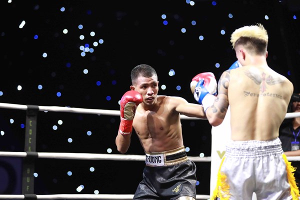 Võ sĩ Việt Nam thắng điểm nhà vô địch Trung Quốc tại giải boxing quốc tế - Anh 4