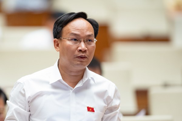 Việc sửa đổi Luật Các tổ chức tín dụng: Phải đảm bảo người dân ở vùng sâu, vùng xa tiếp cận với dịch vụ ngân hàng - Anh 1