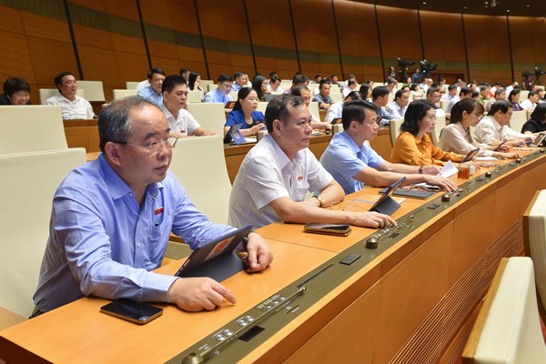 Quốc hội thông qua Nghị quyết thí điểm một số cơ chế, chính sách đặc thù phát triển TP.HCM - Anh 1