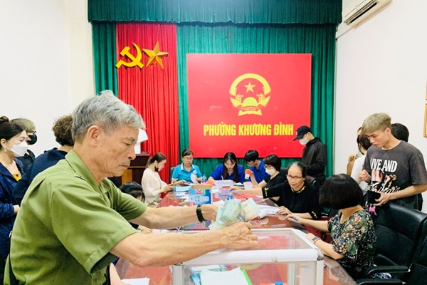 Chi trả tiền hỗ trợ cho các nạn nhân sau vụ cháy chung cư mini ở quận Thanh Xuân: Cẩn trọng là cần thiết, nhưng cần hỗ trợ kịp thời - Anh 1