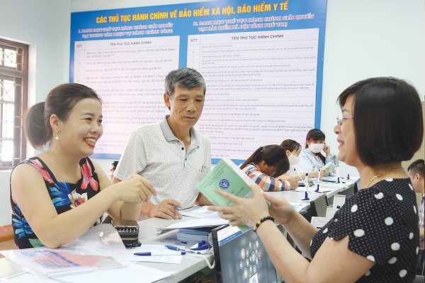 Nỗ lực vượt qua khó khăn, đảm bảo an sinh xã hội cho người dân - Anh 2