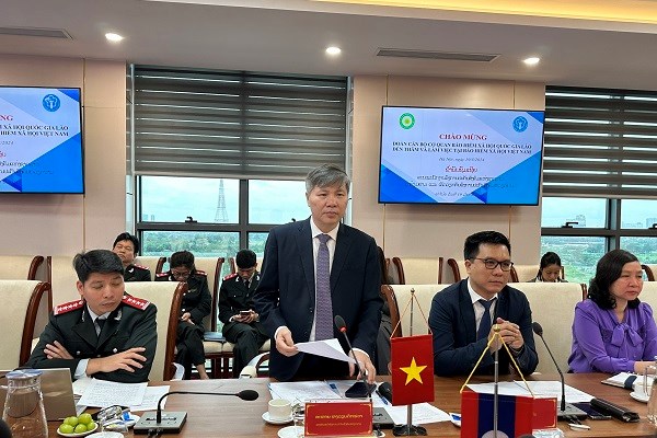 Việt Nam và Lào tăng cường hợp tác trong lĩnh vực an sinh xã hội - Anh 1