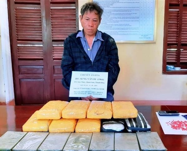 Bắt đối tượng vận chuyển 7 bánh heroin, 56.000 viên ma túy tổng hợp - Anh 1
