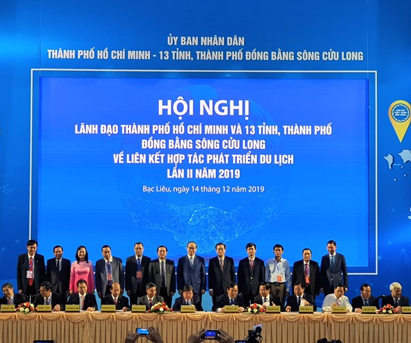 TP.HCM và 13 tỉnh/ thành ĐBSCL ký thỏa thuận liên kết hợp tác phát triển du lịch - Anh 1