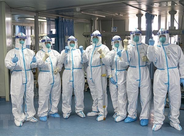 Những 'chiến sỹ áo trắng' kiên cường giữa tâm dịch corona ở Hồ Bắc - Anh 1