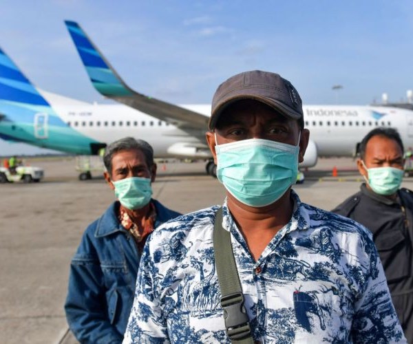 Indonesia quyết mạnh tay xử lý các đối tượng tung tin đồn về corona - Anh 1