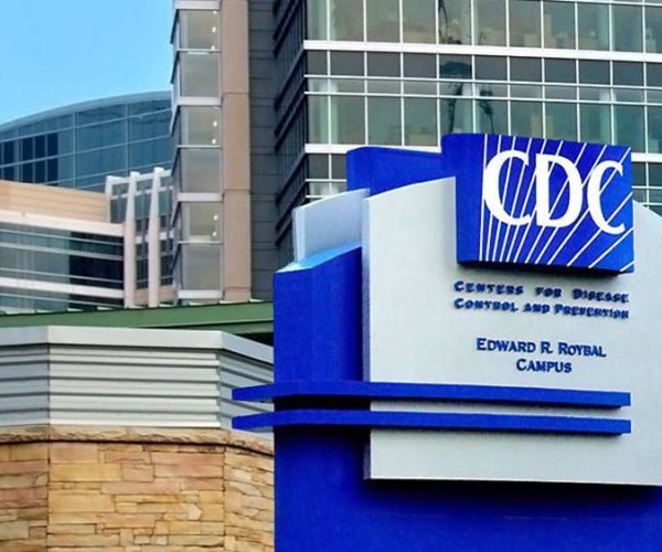 CDC đưa Việt Nam khỏi danh sách điểm đến có khả năng lây lan Covid-19 - Anh 1