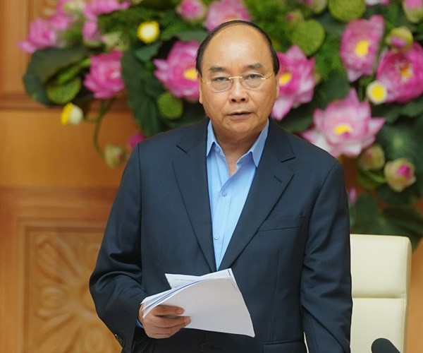 Thủ tướng: Không ngồi chờ, không có cơ chế xin cho trong phòng chống Covid-19 - Anh 1